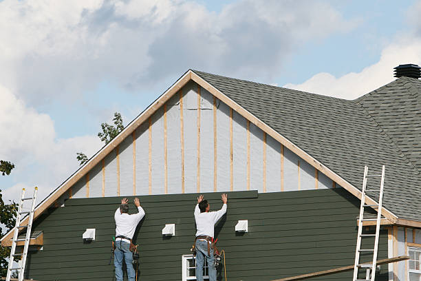 Professional Siding technician working in South Vienna, OH